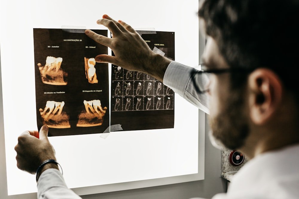 A dentist examining a patient with a dental mirror